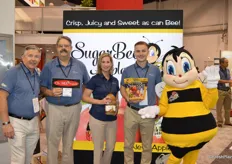 Promoting SugarBee apples with Chelan Marketing are Jay Dyer, Reggie Collins, Julie DeJarnett and Eric Martinson.